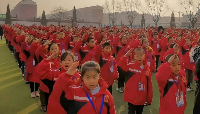 我院国旗护卫队指导安居街小学组建国旗班 我院国旗护卫队指导安居街小学组建国旗班